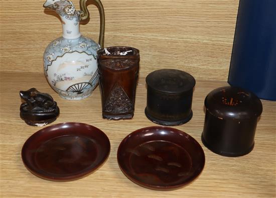 A 19th century lacquered holder, two pots and two dishes